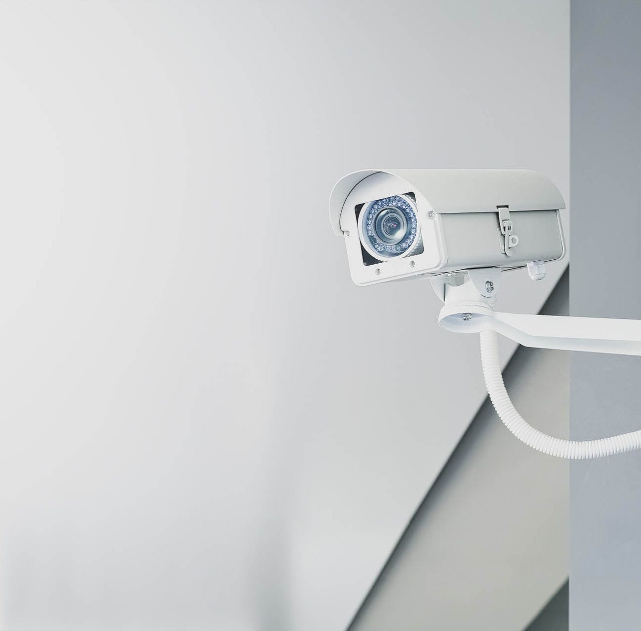 Wall-mounted CCTV security camera installed by K9 Security Services Ltd for home and office surveillance